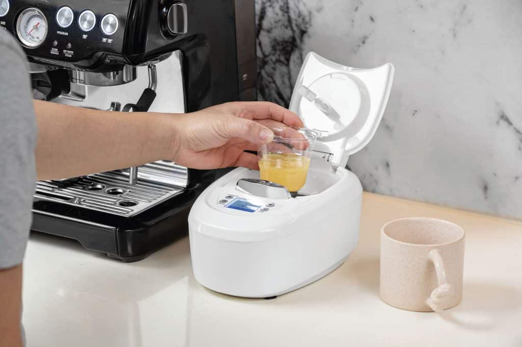 Liquid medicine being poured from MyCare device
